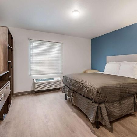 Woodspring Suites Charlotte - University Research Park Bagian luar foto