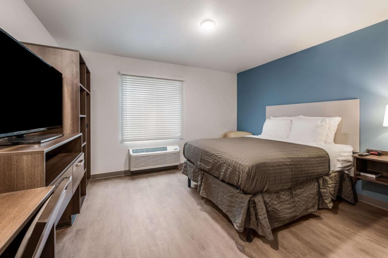 Woodspring Suites Charlotte - University Research Park Bagian luar foto