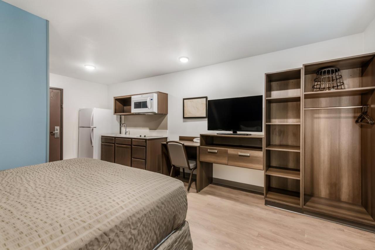Woodspring Suites Charlotte - University Research Park Bagian luar foto
