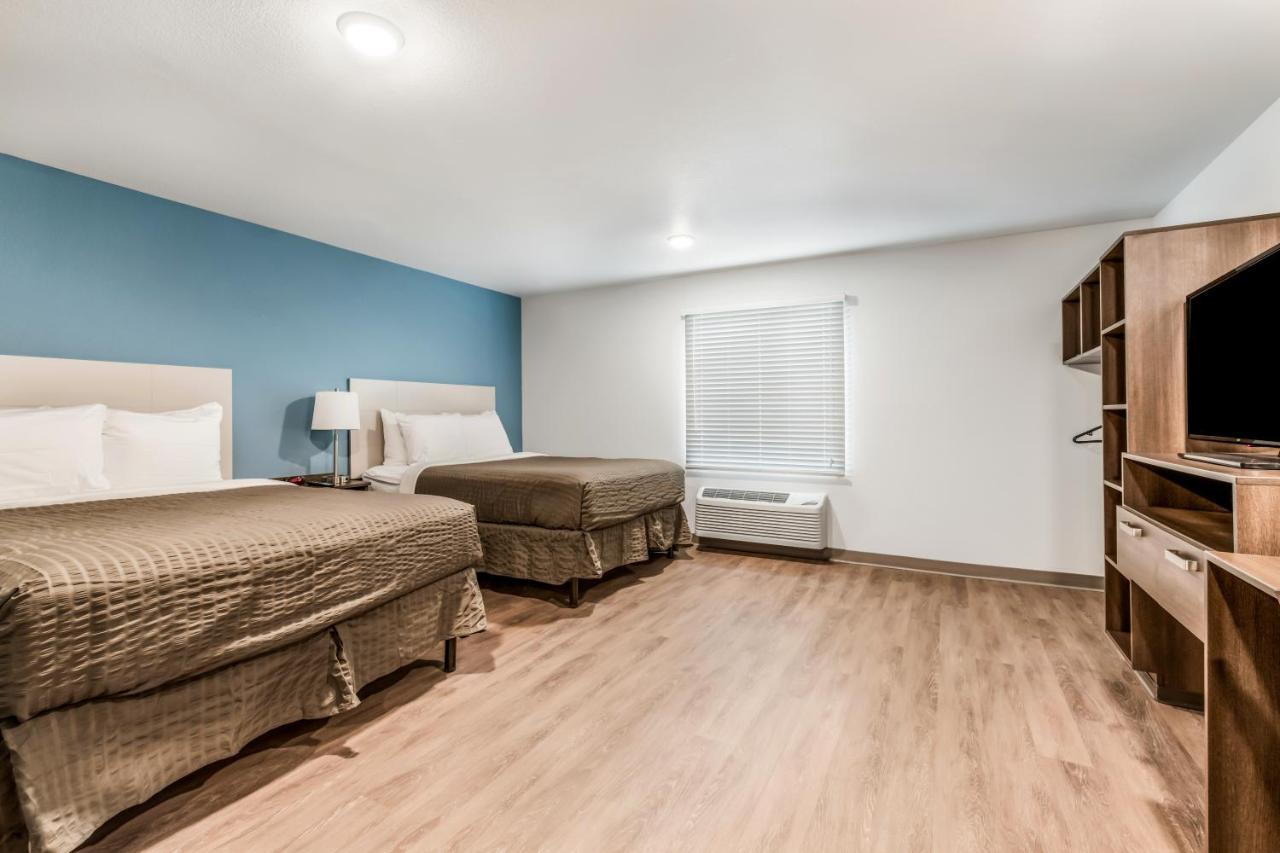 Woodspring Suites Charlotte - University Research Park Bagian luar foto